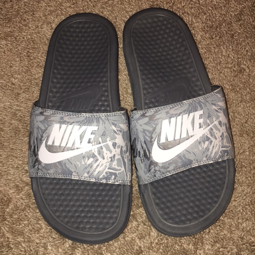 Grey Nike slides